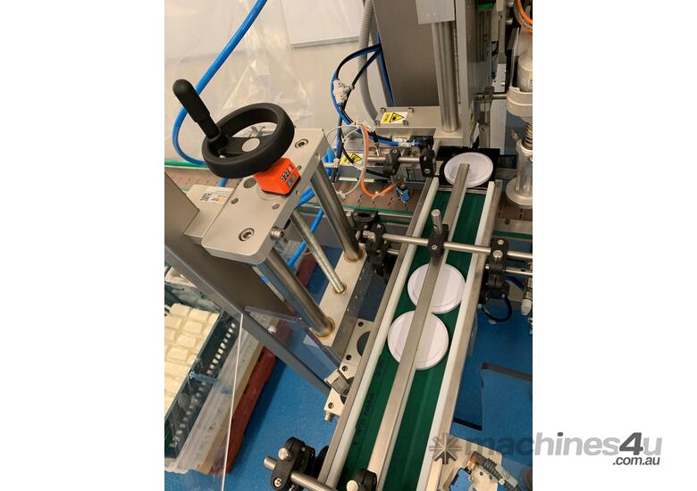 caption Near-new Low Hours: Unilogo Robotics Z2 pick & place Capping Machine