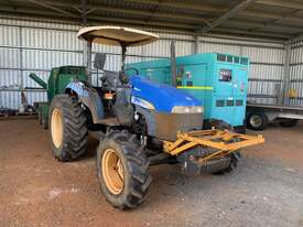 2009 New Holland TD70D 68 HP Front Wheel Assist Farm Tractor - picture1' - Click to enlarge