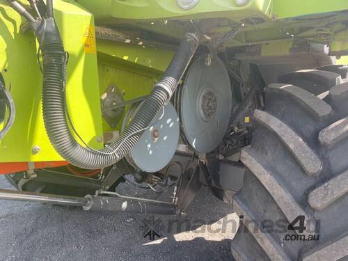 caption 2009 Claas Lexion 580R Harvester