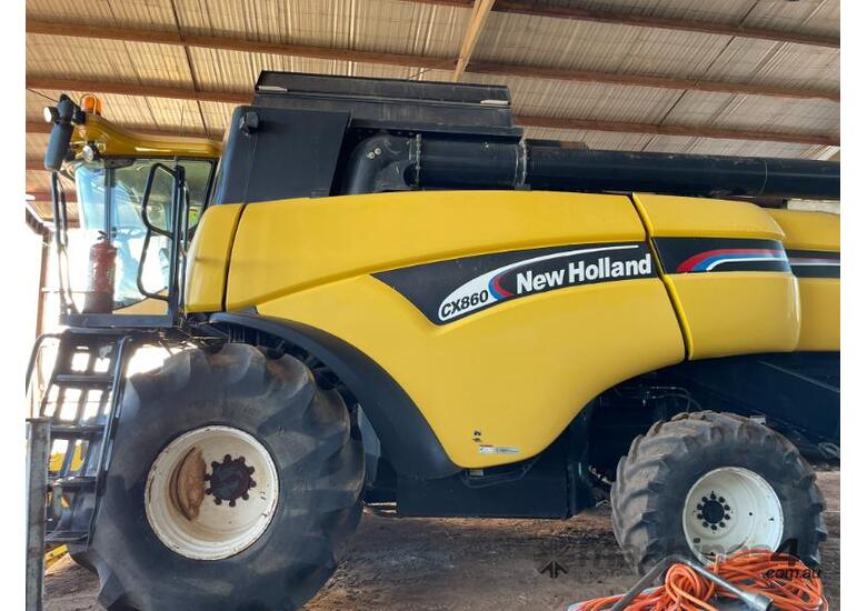 caption CX860 New Holland & New Holland 25' Honey Bee Front on Trailer