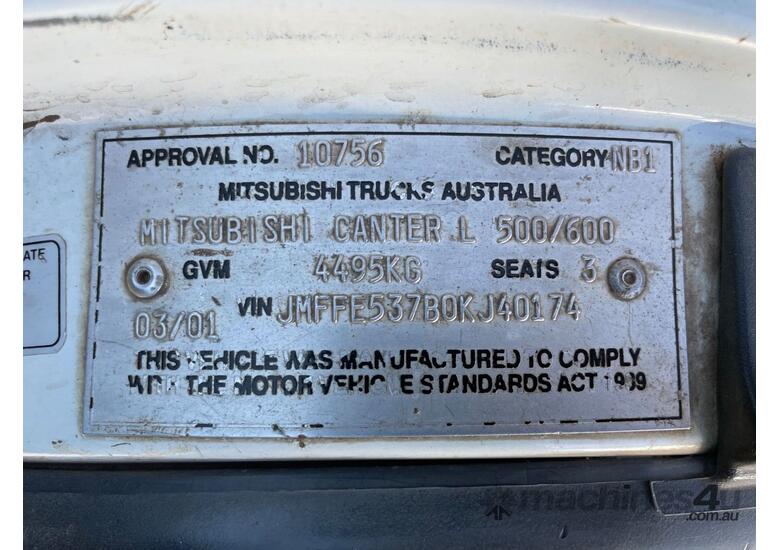 caption 2001 Mitsubishi Canter Cab Chassis