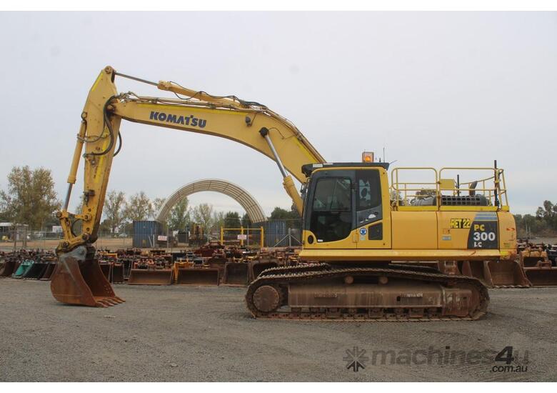 caption 2013 Komatsu Pc300lc-8
