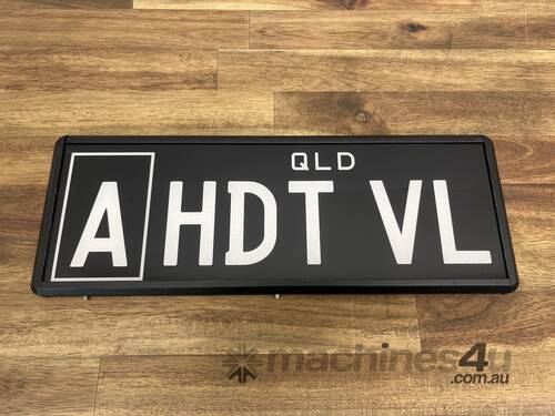 caption QLD Personalised Number Plate - ‘A HDT VL’
