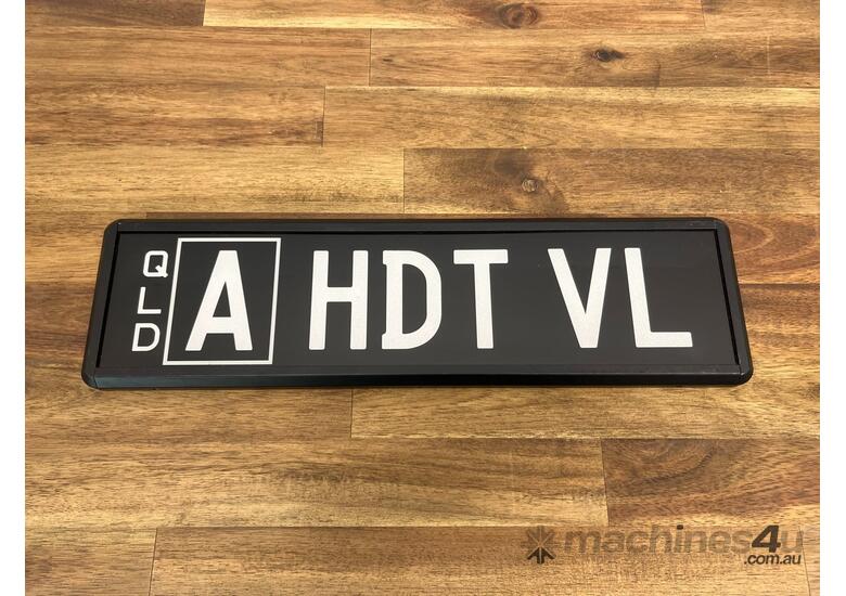 caption QLD Personalised Number Plate - ‘A HDT VL’