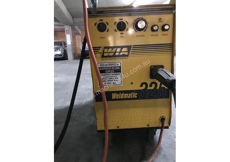caption Mig Welder, Excellent condition .