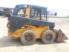 John Deere Skid Steer With Multiple Attachments - picture0' - Click to enlarge