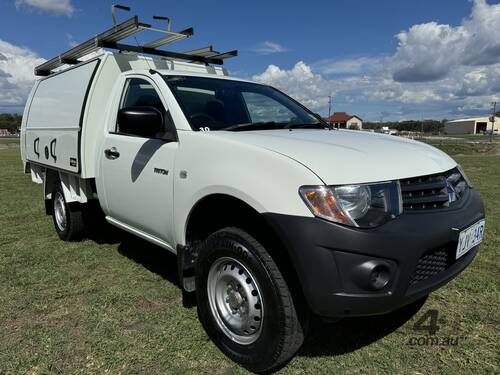 caption Mitsubishi Triton 4x2 Single Cab Traytop Ute