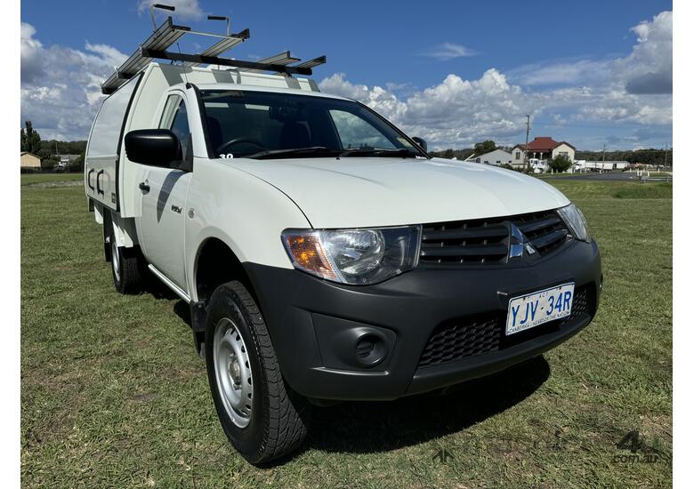 caption Mitsubishi Triton 4x2 Single Cab Traytop Ute