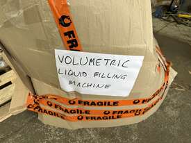 Volumetric Liquid Filling Machine - picture0' - Click to enlarge