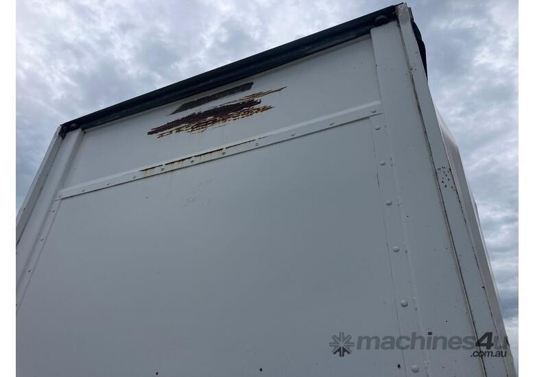 caption 2009 Maxitrans ST3 Tri Axle Drop Deck Curtainside A Trailer