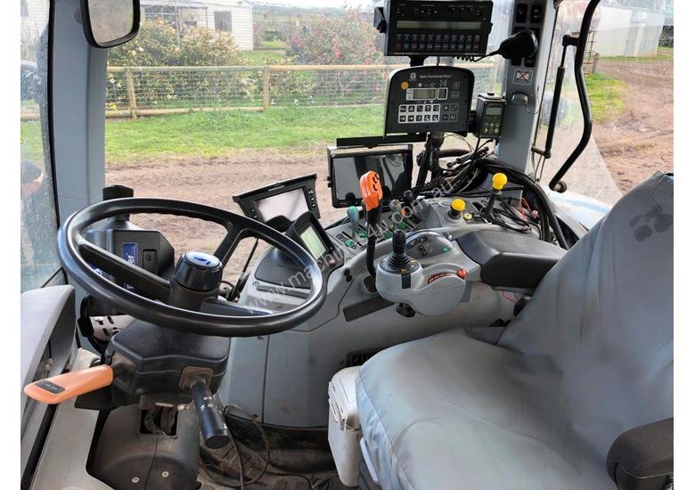 caption 2008 New Holland T7030 tractor