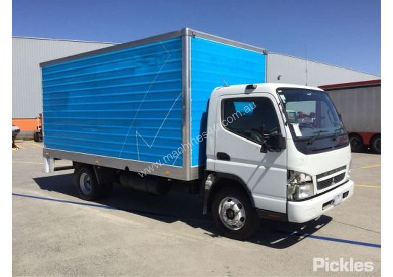 caption 2010 Mitsubishi Canter FE85