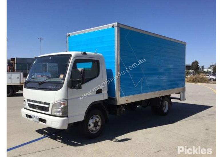 caption 2010 Mitsubishi Canter FE85