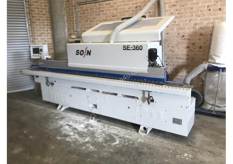 caption Automatic edging machine , panel saw , compressor and Blum