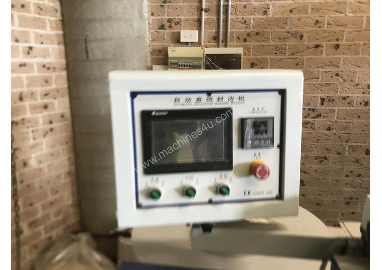 caption Automatic edging machine , panel saw , compressor and Blum