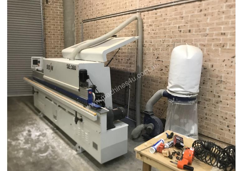 caption Automatic edging machine , panel saw , compressor and Blum