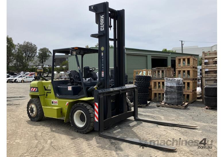caption Clark C60L # 6 Tonne Gas Forklift # 6000kg Load Capacity # 5000mm Lift Height # 1800mm Fork Tynes