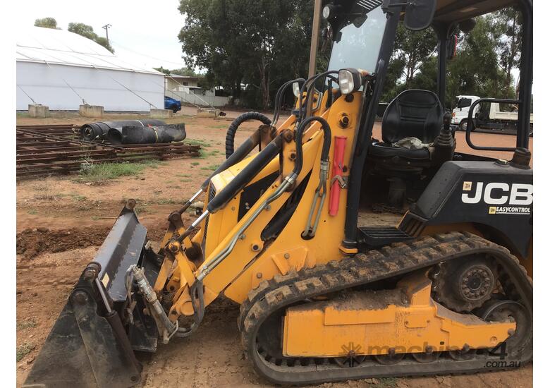 caption JCB 1CXT Backhoe with Attachments