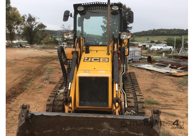caption JCB 1CXT Backhoe with Attachments
