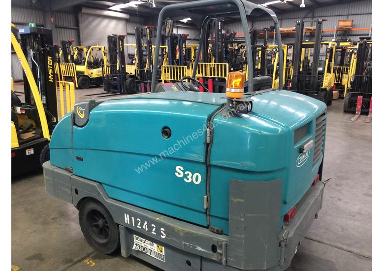 caption Ride-on Sweeper/Scrubber