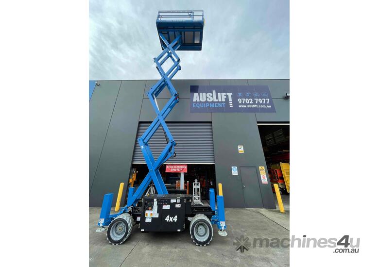 caption NEW Genie GS-3369 32ft Rough Terrain Scissor Lift