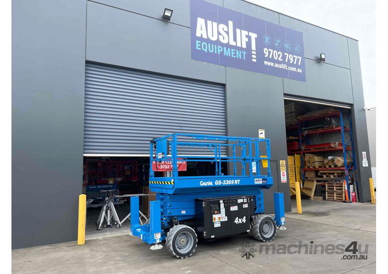 caption NEW Genie GS-3369 32ft Rough Terrain Scissor Lift