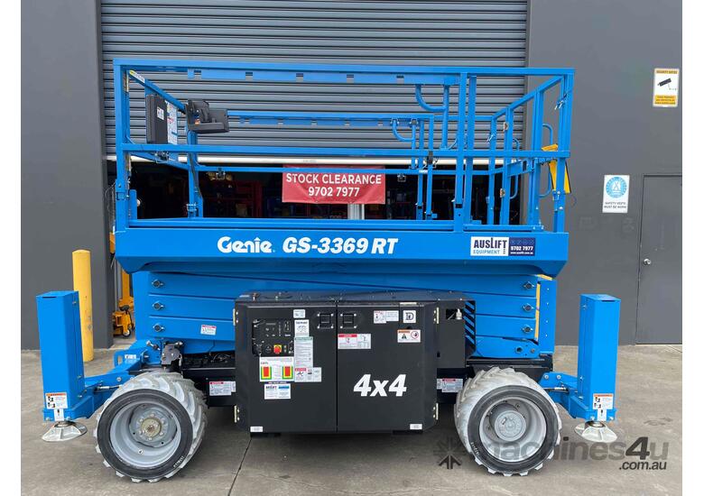 caption NEW Genie GS-3369 32ft Rough Terrain Scissor Lift
