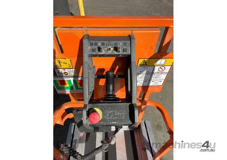 caption JLG 1930ES 19ft Electric Scissor Lift – Perfect for Tight Spaces and Smooth Indoor Access!
