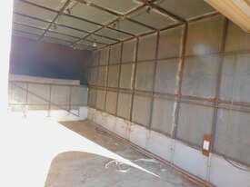 TRUCK TRAY WITH ENCLOSED CANOPY AND LOCKABLE ROLLER DOOR - picture1' - Click to enlarge