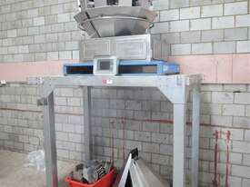 Multihead weigher, mounted on steel platform - picture0' - Click to enlarge