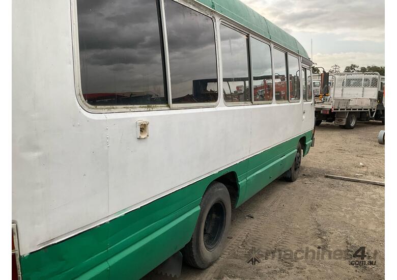 caption 1987 Toyota Coaster Bus