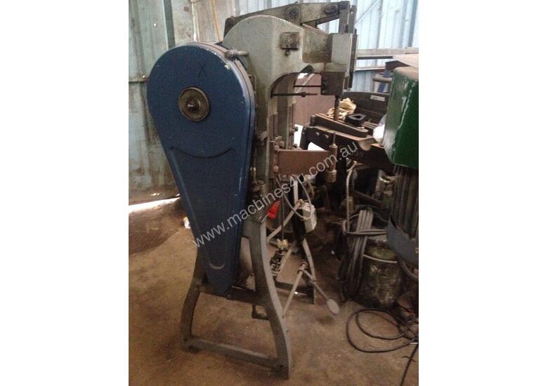 caption Chicago - Riveting Machine