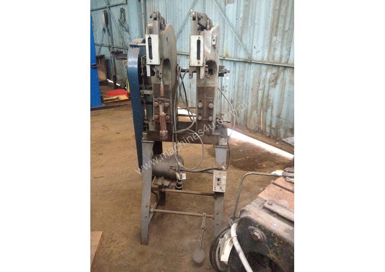 caption Chicago - Riveting Machine