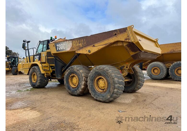 caption 2016 Caterpillar 730C2 ADT - Used, Low Hours, Heavy Hauling & Dumping