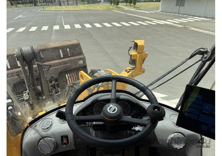 caption 2021 Volvo L120H Articulated Wheel Loader