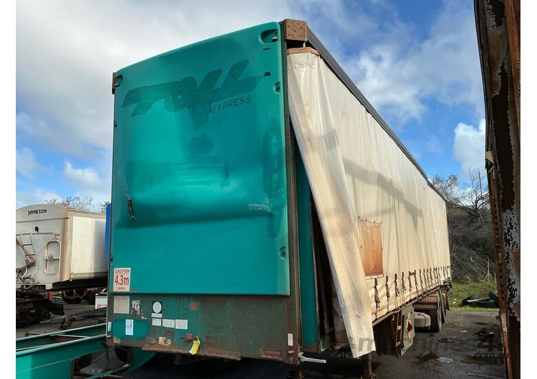 caption 2009 Vawdrey VB SE Tri Axle Flat Top Curtainside Trailer