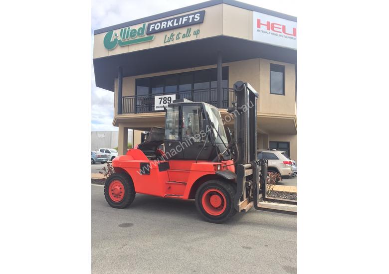caption 12,000Kg diesel Linde forklift with a wide shifting fork positioner