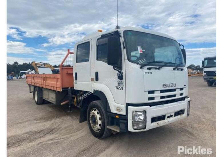 caption 2009 Isuzu FTR900 Crew