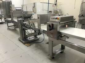 Jumbolino make up line with 6 piston pneumatic depositor, gauging roller and water dripper - picture0' - Click to enlarge