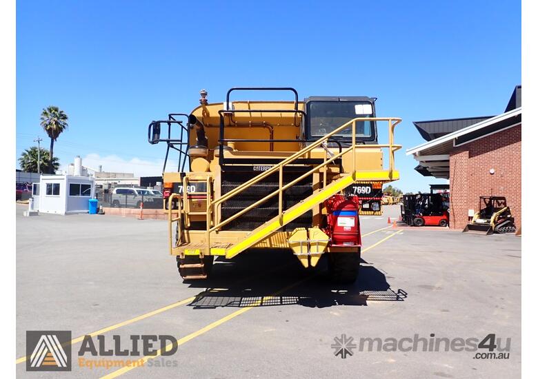 caption 1998 CATERPILLAR 769D OFF HIGHWAY WATER CART