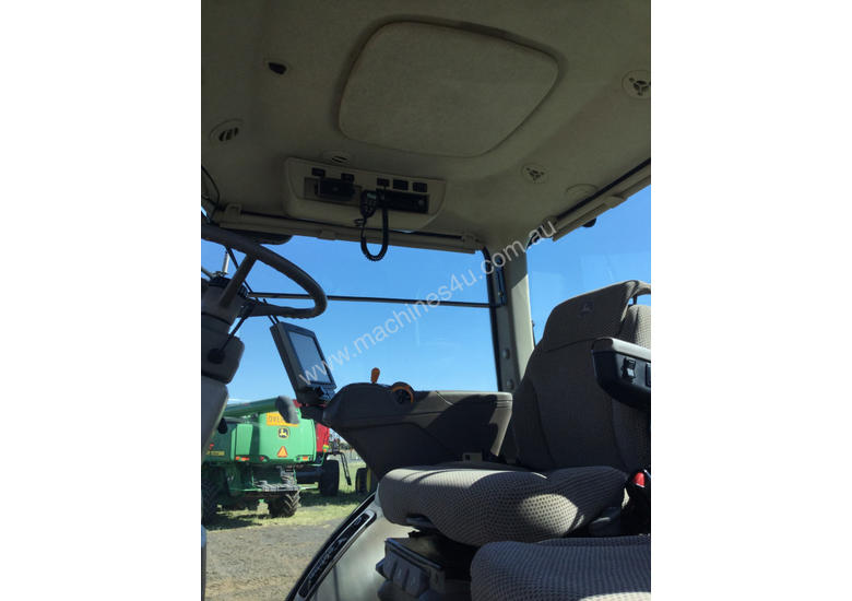 caption John Deere 8320R FWA/4WD Tractor