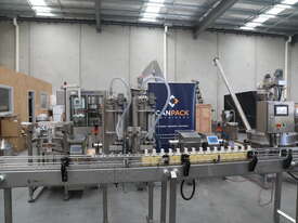 2-Head Bottle Filling Line - picture0' - Click to enlarge