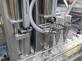 2-Head Bottle Filling Line - picture2' - Click to enlarge