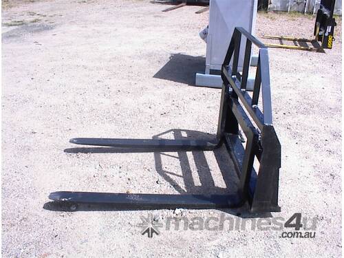 Skid steer fork attachment