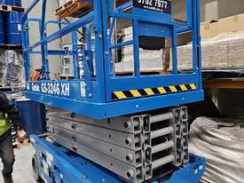 GENIE GS3246 Scissor Lift ONLY 15hrs and Trailer INC - picture0' - Click to enlarge