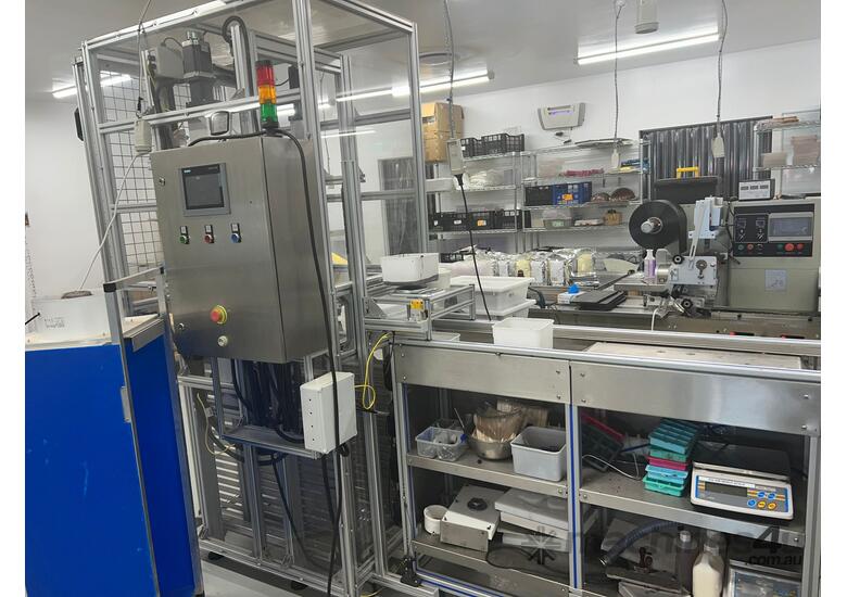 caption Automatic moulding line & stacking trolley
