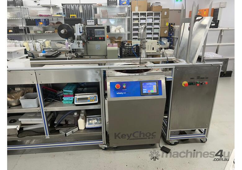 caption Automatic moulding line & stacking trolley