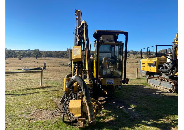 caption Atlas Copco Drill Rig