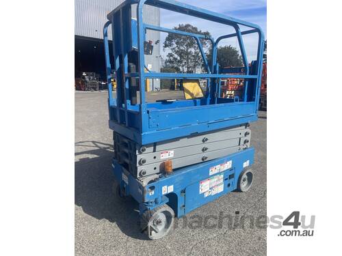 caption GENIE USED 19FT ELECTRIC SCISSOR LIFT