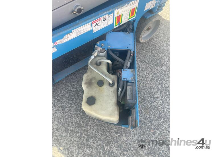 caption GENIE USED 19FT ELECTRIC SCISSOR LIFT